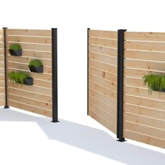 three wooden panels with plants growing on them