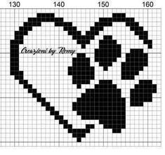 a cross stitch pattern with black and white designs