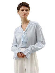 The palace pleat design on the cuffs adds an extra element of sophistication, creating an atmosphere of refined elegance. Whether it's for work or casual outings, this blouse is versatile and suitable for any occasion. 23MM Ghost Crepe V-neck Neckline ribbon Pleated cuffs Suitable for casual work and vacations Ribbon Blouse, Womens Active Wear Outfits, Silk Nightwear, Blouse Nordstrom, Bridal Robes, Black Friday Shopping, Active Wear Outfits, Casual Work, Crepe Fabric