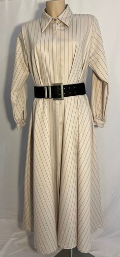 Wonderful, chic flare in A-line long (up to ancle) shirt dress in beige color with black stripes, ideal for every day and evening looks. Collared neckline with buttons all the way down for closure. Belt is optional.  Measurements: Length: 137cm, Bust: 96cm Beige Shirt Dress, Flare Shirt, Shirt Dress Long, Vintage Shirt Dress, Beige Shirt, Long Shirt Dress, Chic Vintage, Shirtdress, Way Down