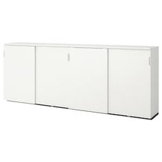 a white cabinet with three doors on each side