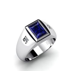 Simply stated and perfectly on-trend, this sapphire ring lends a look of refined sophistication to just about any attire. ---------------------- Metal: Sterling Silver Purity: 925 (hallmarked)Gemstone: SapphireCarat Total Weight: 2.40Cut: Faceted Rectangle0.8 x 0.6 cm (0.3" x 0.2")Setting Type: BezelAccent Stones: DiamondsCarat Total Weight: 0.06Setting Type: Pave Cut: GoodColor: HClarity: VS1Ring width: 5.2 mm / 0.2" wide across the undersideProduct weight: 10 gr (0.35 oz) Formal Sterling Silver Signet Ring With Rectangular Stone, Rectangular Lab-created Sapphire Fine Jewelry, Sapphire Rings Emerald Cut For Formal Occasions, Modern White Gold Rings With Rectangular Stone, Modern White Gold Ring With Rectangular Stone, Modern Jewelry With Rectangular Accent Stones, Rectangular White Gold Ring With Center Stone, White Gold Sapphire Ring With Square Cut Diamond, Radiant Cut Tanzanite Ring For Formal Occasions