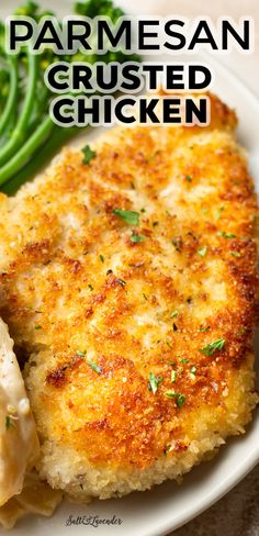 parmesan crusted chicken on a plate with green beans