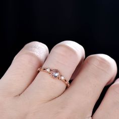 This is a dainty moonstone & diamond engagement ring. A perfect anniversary gift, birthday gift,wedding engagement ring.Great as a gift or a anniversary ring. Ring Information Stones *4mm round cut Natural moonstone. *Natural Real Diamonds. SI Clarity and H Color. Metal * Solid 10k 14k &18k. *Color:white gold,yellow gold,rose gold. Custom Order *The main stone can be other gemstones you can imagine,any birthstone can be made.Please contact me if you need this service. *Any size *I can al Promise Moonstone Ring With Rose Cut Diamonds, Moonstone Promise Ring With Rose Cut Diamonds, Delicate Moonstone Crystal Ring For Anniversary, Anniversary Moonstone Ring With Rose Cut Diamonds, Diamond Open Moonstone Promise Ring, Moonstone Rings With Diamond Accents For Gift, Moonstone Ring With Diamond Accents As Gift, Moonstone Crystal Ring With Rose Cut Diamonds As Gift, Moonstone Ring With Diamond Accents For Gift