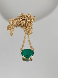 New! Custom Luxury Jewellery 18K Karat Solid Yellow Gold Oval Cut Green Emerald Prong Pendant Necklace with Small Link Chain Gift For Her  18 inch chain length 4.5 grams total weight  1.97 ct Oval Colombian Emerald Jewelry Appraisal Available Upon Request (+60$ CAD Extra) Please Check Out This Similar Emerald Cut Rectangular Emerald Listing With The Following Link: https://www.etsy.com/ca/listing/1181951339/new-custom-womens-jewellery-18k-karat?click_key=e2397d498fe40693a0142eb1769d265fd81d4417%3A1181951339&click_sum=1a907483&ref=shop_home_active_1&frs=1 14k Stamped Yellow Gold Oval Necklace, Oval 14k Stamped Yellow Gold Necklace, Classic Yellow Gold Emerald Necklace With Oval Pendant, Classic Oval Emerald Necklace In Yellow Gold, Classic Yellow Gold Oval Emerald Necklace, Green Oval Jewelry With Adjustable Chain, Oval Necklaces With Adjustable Chain For Anniversary, Classic Gold Emerald Necklace With Oval Pendant, Classic Gold Emerald Oval Pendant Necklace