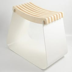 a white stool with wooden slats on it