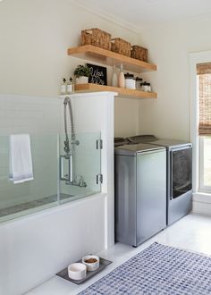 a washer and dryer in a small room