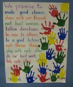 a bulletin board with handprints on it that says we promote to make good choices