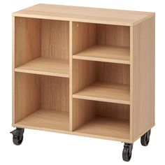 a wooden shelf with four shelves on casteors and wheels for storage or holding items