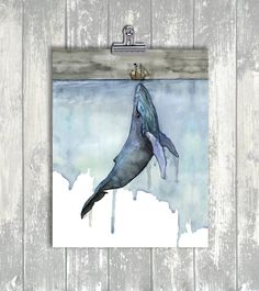 a painting of a whale with a crown on it's head hanging from a wooden frame