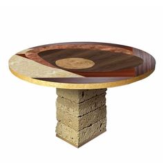 a wooden table that is on top of a stone pedestal with different colors and shapes