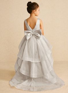 We encourage all our flower girls to feel like the princess they are while wearing Pumpkin. Made from matte satin and tulle, she features a scoop neckline, a bow tie belt, a ruched A-line silhouette, and a tiered tulle skirt trimmed with horsehair. Frost Flower, Tiered Tulle Skirt, Pumpkin Flower, Tulle Flower Girl, Flower Girl Dresses Tulle, Feel Like A Princess, Matte Satin, Horse Hair, Flower Girls