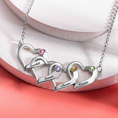 Choose name and birthstone for each heart for a completely unique and custom look, which of the meaning you two are together. This adorable heart sterling silver birthstone necklace is of top quality, means to last a lifetime. It would make a beautiful gift for a mom, or as part of a memorial charm necklace! Sterling Silver Birthstone Necklace, Children Names, Intertwined Hearts, Creative Necklace, Necklace Length Guide, Hearts Necklace, Lasting Love, Necklace Chain Lengths, Rolo Chain