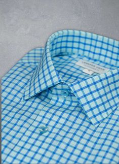 The dreamy feel of the super soft Alexander in Aqua Blue Plaid Shirt evokes the relaxed Mediterranean lifestyle, with its shimmering shades of Blue. Deliberately detailed with well-thought-out accoutrements such as matching blue buttons and button threads lend a custom look to this beautiful shirt. Can be dressed up under a blazer or worn untucked, for a more casual, after-hours look. The Alexander is the trimmest of all our fits, calibrated to accentuate a lean, athletic body type. • Trimmest F Athletic Body Type, Boulevardier, Mediterranean Lifestyle, Athletic Body, Blue Plaid Shirt, Mens Shirt, Mens Shirt Dress, Blue Plaid, Sports Shirts