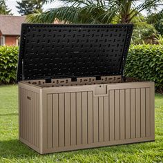 an outdoor storage box in the grass