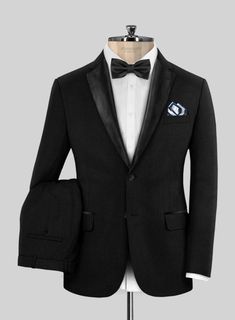 The Deep Black Tuxedo Suit commands the spotlight with its sharp razor-like cut and dark black color that's deeper than most standard black tuxedo suits. This tuxedo suit is crafted from pure wool and features an exceptional quality all-seasonal fabric. However, due to its formal nature, it's best suited for evening events with a black tie dress code, such as weddings or corporate events.  
 
 Featuring satin lapel, matching satin covered buttons and gentle texture at its surface, our tuxedo is