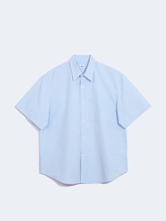 Editor's NotesThis casual oversized button-down shirt is made from high-density cotton-nylon blend. It's designed with a single pocket and reversed seam finish.- Collared neck- Button fastenings- One chest pocket- Drop shoulder- Short sleeves- Curved hem- Oversized fitMeasurements (in.) M / L- Shoulder: 22.2 in. / 22.8 in. - Chest: 23.8 in. / 24.6 in.  - Sleeve Length: 10.8 in. / 10.8 in. - Total Length: 30.7 in. / 31.3 in.  Composition & Care- 69% Cotton, 31% Nylon- Dry clean- Do not tumble Oversized Casual Shirt With Placket, Cotton Shirt With Pockets And Shirttail Hem, Blue Tops With Welt Pockets For Spring, Casual Oversized Shirt With Welt Pockets, Oversized Short Sleeve Shirt For Work, Solid Cotton Shirt With Patch Pockets, Solid Color Shirt With Pockets For Daywear, Blue Shirt With Patch Pockets For Spring, Oversized Short Sleeve Work Shirt