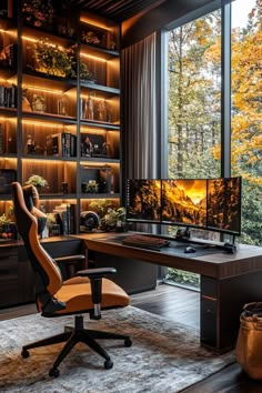 a home office with a desk, chair and computer monitor in front of a large window