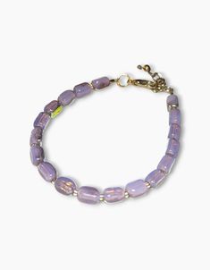 Beautiful Czech crystals in purple opal bracelet  Silver plated clasp and extension chain  6.75 inches and extends up to 8 Lavender Adjustable Beaded Crystal Bracelet, Adjustable Czech Glass Jewelry Bracelet, Adjustable Nickel-free Purple Charm Bracelet, Lavender Beaded Bracelet Jewelry, Adjustable Purple Single Strand Jewelry, Adjustable Nickel-free Purple Beaded Bracelets, Czech Glass Bracelets With Lobster Clasp As Gift, Elegant Purple Czech Glass Bracelets, Lavender Czech Glass Jewelry Gift