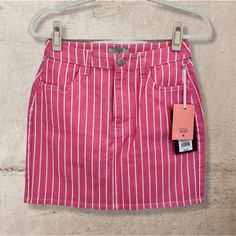 New With Tags Striped Pink Denim Mini Skirt Size 2 Pink With Vertical White Stripes Front Pockets Waist: 27 In, Hips: 37 In, Inseam Length: 8 In, Total Length: 16 In 98% Cotton, 2% Spandex Trendy Mini Skirt For Spring, Trendy High-waist Skirt For Spring, Trendy High Waist Skirt For Spring, Pink High-waisted Denim Skirt For Spring, High Waist Striped Summer Skirt, Summer High Waist Striped Skirt, Spring High Waist Cotton Skort, High-waist Cotton Skort For Spring, Spring Striped Mini Skort