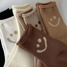 SUPER COZY AND CUTE HAPPY FACE SOCKS! Elevate your sock game with these super cozy and cute facesocks featuring a happy face on ankle. These socks with faces on them are the perfect way to add a touch of cheerfulness to any outfit. Crafted from soft and breathable fabric, they offer comfort and style in one delightful package. Let these face socks bring a smile to your face and spread positivity wherever you go. Comfy and Fashionable pair of socks Our happy face socks come in one unisex size and Cute Smiley Face, Face Socks, Womens Socks, Sock Game, Sock Packs, Spread Positivity, Women's Socks, Cute Happy, Cute Socks