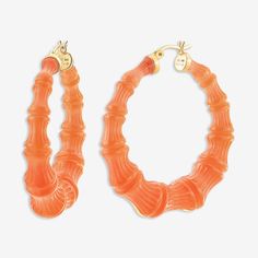 WHEN YOU NEED A VACATION WHAT IT IS: A chic pop of colorWHY IT’S SPECIAL: If you're looking for the perfect orange, you've found it! Colorful but easy to wear, these hoops add just the right pop of color. The details in the bamboo design elevate these to a notch above your average hoops GOOD TO KNOW: Handcrafted Lucite 14K Gold plated, sterling silver posts Size: 2" Due to their handmade nature, each piece is unique WHY WE LOVE GOLD AND HONEY: These four sisters bridge the gap between fashion an Casual Orange Earrings, Orange Small Hoop Earrings For Summer, Summer Orange Small Hoop Earrings, Trendy Small Hoop Orange Earrings, Trendy Small Hoop Orange Jewelry, Orange Small Hoop Summer Jewelry, Summer Orange Hoop Jewelry, Orange Small Hoop Jewelry For Summer, Summer Orange Small Hoop Jewelry