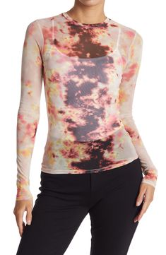 A vibrant printed mesh top brings chic, eye-catching style to any outfit. . Jewel neck. Long sleeves. Allover print. Mesh construction. Sheer. Slightly cropped. Approx. 23" length (size S). Imported Machine wash 95% polyester, 5% spandex Fitted Long Sleeve Lace Top For Spring, Trendy Fitted Long Sleeve Crop Top, Trendy High Stretch Long Sleeve Top For Spring, Trendy High-stretch Long Sleeve Top For Spring, Spring Fitted Mesh Top With Sheer Sleeves, Spring Layering Stretch Mesh Top, Summer Long Sleeve Top For Layering, Mesh Long Sleeve Tops For Layering, Fitted Mesh Top With Mesh Sleeves For Spring