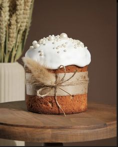 a cake sitting on top of a wooden table