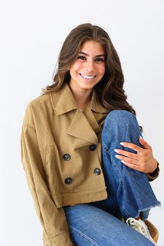 Unleash your inner fashionista with the Lizzy Double Breasted Tan Blazer! Make a statement with its cropped and relaxed fit, featuring long sleeves and a gorgeous tan color. Perfect for any occasion, this versatile blazer can elevate any everyday look. Whether you dress it up or down, this blazer is sure to make you stand out and feel confident! Runs true to size, cropped in length If worried about the length, we recommend sizing up Wash cold on gentle, hang to dry Color may vary due to lighting on image Flawless Chic Brown Cropped Jacket, Chic Cotton Cropped Jacket For Winter, Brown Cropped Outerwear For Work, Cropped Brown Outerwear For Work, Chic Long Sleeve Cropped Jacket For Spring, Long Sleeve Cotton Cropped Jacket For Day Out, Casual Cropped Outerwear For Day Out, Chic Cotton Cropped Jacket For Fall, Cotton Cropped Long Sleeve Jacket For Day Out