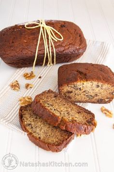 sliced loaf of banana nut bread sitting on top of a table