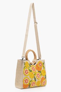 Luxe Embellished Handbag Embellishments all-over in lemon patterns Detachable long straps, round cane handles Magnetic Button closure Lined interiors with zip pocket Size : 11.5" X 9" X 3.5" An instant mood uplift with our Orange beaded handbag. Cute as a button, retro like lyrics, made for a day out in the sun, this bag loves long drives, Sunday brunches and lots of pictures. Add a pop of color to your wardrobe with this Luxe Embellished handbag. The bag is adorned with all-over lemon patterns Yellow Top Handle Straw Bag For Summer, Summer Shoulder Bag With Detachable Strap And Round Handle, Yellow Crossbody Satchel For Summer, Summer Yellow Shoulder Bag With Top Handle, Yellow Double Handle Satchel For Summer, Summer Shopping Satchel With Adjustable Handle, Spring Yellow Satchel With Adjustable Strap, Spring Bags With Detachable Round Handle, Summer Vacation Straw Bag With Handle Drop