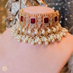 This bridal set is a stunning combination of remarkable craftsmanship and beautiful colors! Our Yashfa Set is bedecked with stunning ruby stones and pearl beads to create a perfect celebratory set. With an all over stone work, this set is timeless and memorable. The set includes a matching maang teekah, a jhoomar, a nose ring and a pair of beautiful earrings. Approximate earrings length is 4.25". This set is available in 3 options: Necklace + Earrings Necklace + Earrings + Teekah Necklace + Earr Unique Gift Cards, Heritage Jewellery, Ruby Stone, Faux Stone, Head Accessories, Stone Work, Pink Beads, A J, Bridal Set