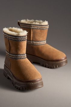 Best for light or moderate rain, light snow Waterproof suede, leather upper UGGplush™ 60% upcycled wool, 40% TENCEL™ Lyocell lining Cold-weather rated to -20˚C Seam-sealed construction Foam footbed Rubber sole Pull-on styling Imported | Classic Mini TrailGazer Boots by UGG in Beige, Women's, Size: 9, Leather/Wool/Rubber at Anthropologie Snowy City, Winter Hiking Boots, Boots For Winter, Trendy Flats, Travel Boots, Ugg Classic Mini, Trendy Boots, Cute Boots, Stylish Boots