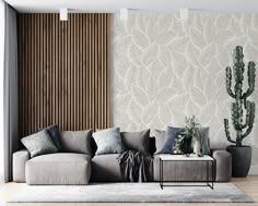 a living room filled with furniture and walls covered in wall coverings next to a cactus