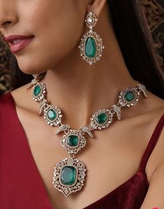 Sparkly Emerald Doublet Victorian CZ Long Necklace with AAA quality CZ stones and fine Kundan. Real Emerald Doublet stone user This necklace comes with Earrings as well Necklace Length - 21 inches Earrings Length- 2.5 inches This Long Necklace has global appeal and represents elements of Indian, Pakistani as well as Punjabi Jewelry 18 K Victorian plated Earrings Closure: Pushback Necklace length Adjustable with chain  Earrings have pushbacks  Highest quality and craftsmanship Please let me now if you have any questions Customized orders takes 3 to 4 weeks, depending on piece requirements. The Ombre Designs Jewelry pieces can be customized in accordance with your requirement. Please Email or Whats app on : +91 8448833193 / sonalikamehra [!at] theombredesigns.com Luxury Heavy Green Temple Necklace, Luxury Kundan Emerald Necklace, Luxury Gift Emerald Chandbali Necklace, Diamond Pendant Jewelry For Reception, Diamond Gemstone Jewelry For Reception, Diamond Pendant For Reception, Reception Diamond Gemstone Jewelry, Diamond Jewels Necklace For Reception, Diamond Necklace With Jewels For Reception