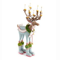 a christmas reindeer figurine with lights on it's antlers and decorations