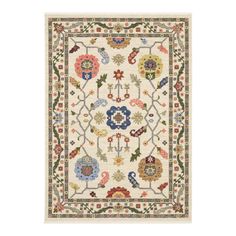 a white rug with colorful flowers and leaves on the bottom, in an ornate design