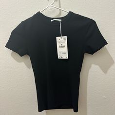 Brand New With Tags Zara Black Shirt Zara Short Sleeve Tops For Work, Fitted Black T-shirt For Work, Classic Black Stretch Shirt, Trendy Black Zara T-shirt, Simple Short Sleeve Tops For Workwear, Simple Short Sleeve Workwear Tops, Simple Short Sleeve Tops For Work, Classic Black Stretch T-shirt, Basic Short Sleeve Tops For Work