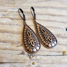 Antiqued Copper Filigree Teardrop Earrings Just got in! These teardrops are amazing in their elegant simplicity!! Gorgeous copper work. I hung simply on  either antiqued copper (plated brass for strength) leverback wires or artisan antiqued copper french hooks.   You may be attracted to the more slender pair in the second to the last image. See more about that pair of earrings here, https://www.etsy.com/listing/1302674323/antiqued-copper-long-dangle-teardrop  I also have the same style in antiqu Metal Teardrop Earrings With Lever Back, Nickel-free Copper Dangle Teardrop Earrings, Elegant Copper Teardrop Earrings, Vintage Teardrop Drop Earrings With Ear Wire, Vintage Nickel-free Teardrop Earrings, Vintage Copper Teardrop Earrings, Bohemian Teardrop Earrings With Lever Back, Metal Teardrop Dangle Earrings With Lever Back, Teardrop Earrings With Lever Back Ear Wires