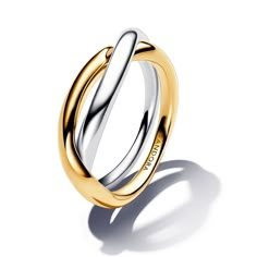 From Pandora, two tones are better than one with the Two-Tone Entwined Bands Ring. This ring features two slightly wavy rounded bands - one sterling silver and one 14k gold-plated - that overlap and intertwine with one another. The best part about this sleek, sculptural style is that you don't have to choose your favorite metal because it features both, making it an extra versatile addition to your own collection or as a gift for a loved one. Pandora Style #: 163262C00-56 Silver And Gold Stacking Rings, 2 Tone Jewelry, Two Toned Rings, Two Toned Ring, Two Tone Jewelry Stack, Two Toned Jewelry, Gold And Silver Jewelry Together Mixed Metals, Mixed Metal Ring Stack, Silver And Gold Wedding Ring