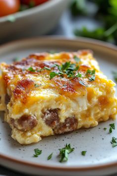 a close up of a plate of food with cheese and other foods in the background