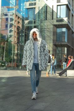 White hooded jacket with removable sleeves, Sleveless faux fur coat, Man jacket with hood, Burner coat Meet our hooded jacket with removable sleeves! Stylish thick faux fur looks like royal ermine imitation. The coat quickly turns into the vest or vice versa. Definitely statement item, that looks cool on the rave party or just as a conspicuous street style piece. DETAILS: ▪️ white faux fur with black tails ▪️ white lining ▪️ hook closures ▪️ side pockets ▪️ one interior pocket ▪️ oversize hood ▪ Casual Hooded Fluffy Fur Coat, Fall Hooded Faux Fur Coat, Fall Faux Fur Hooded Coat, Streetwear Faux Fur Lined Outerwear, Streetwear Outerwear With Faux Fur Lining, Casual Long Faux Fur Coat, Hooded Fur Coat With Faux Fur Trim For Winter, Hooded Winter Fur Coat With Faux Fur Trim, Winter Faux Fur Outerwear For Streetwear