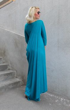 "New women draped dress with pleated shoulder. Long bridesmaid pintuck dress in a deep blue-green color that matches so perfectly the ocean. The extra soft fabric makes it comfortable to wear even in those rough dog days. Material: 95% viscose, 5% elastane Care instructions: Wash at 30 degrees. The model in the picture is size S. Can be made in ALL SIZES. If you have any other specific requirements, do not hesitate to contact me! I DO NOT CHARGE EXTRA MONEY for custom made items. All you need to Blue Pre-draped Dress With Pleated Bodice, Pre-draped Floor-length Dress With Folds, Floor-length Pre-draped Dresses With Folds, Blue Pleated Back Maxi Dress, Blue Draped Dress With Folds, Blue Draped Dress With Pleated Bodice, Blue Maxi Dress With Pleated Back, Blue Pleated Back Dress For Evening, Blue Evening Dress With Pleated Back