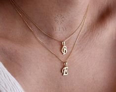 14K Solid Gold Initial Necklace, Cursive Letter Pendant, Minimal Letter Choker Description ITEM DETAILS Material: 14K Gold (Solid Gold) Approx: 1.40 grams Available colors: Yellow Gold Available Sizes: 14" to 20" (Contact for different sizes)   ABOUT PRODUCT The 14K Solid Gold Initial Necklace is a beautiful and personalized piece of jewelry that is perfect for any occasion. This cursive letter pendant necklace features a delicate initial charm made from high-quality 14K gold, which can be customized with the letter of your choice. The necklace has a dainty and minimal design, making it a fashionable and versatile choice for any outfit. This initial necklace is a great gift for any woman or man who loves personalized and dainty jewelry. It's a thoughtful and meaningful gift for Christmas,