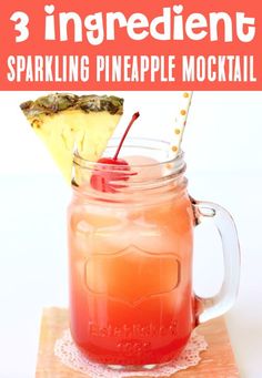 a drink in a mason jar with a slice of pineapple on top