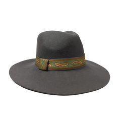 A stunning hat! Paisley band. 4" wide brim. Elastic drawstring in satin band inside. C-crown, slight pinch. One size fits most. 100% wool felt. Felt Fedora, Fedora Hat, Wide Brimmed, Wool Felt, Fedora, Paisley, Felt, Elastic, Wool