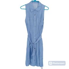 Cupshe Women's Belted Sleeveless Shirt Dress V Neck Button Front Dresses Casual Summer Color: Blue Size: Medium Summer Collared Sleeveless Dress, Spring Casual Sleeveless Collared Dress, Blue Sleeveless Dress With Button Closure For Spring, Sleeveless Shirt Dress For Summer Daywear, Casual Sleeveless Midi Dress, Sleeveless Shirt Dress For Spring Vacation, Blue Sleeveless Shirt Dress For Day Out, Sleeveless Summer Vacation Shirt Dress, Sleeveless Shirt Dress For Beach In Spring