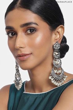 Now shop Chandbali Earrings at a reasonable price on the karma place website. #chandbaliearrings #chandbaligoldearrings #chandbaliearringsgold #goldchandbaliearrings #diamondchandbaliearrings #chandbaliearringssilver #chandbaliearringsonlineusa #chandbaliearringsingold #chandbaliearringsonline #chandbaligoldearringsonline #buychandbaliearringsonline #simplechandbaliearrings #bigchandbaliearringsonline #chandelierearrings #chandelierearringswedding #chandelierearringsdiamond #chandelierearrings Luxury Bridal Chandbali Earrings With Intricate Design, Luxury Heavy Earrings For Festivals, Cheap Heavy Earrings For Festivals, Luxury Handmade Chandbali Bridal Earrings, Luxury Chandbali Chandelier Earrings With Latkans, Luxury Jeweled Chandbali Chandelier Earrings, Luxury Chandbali Jewelry For Marriage, Luxury Tilla Chandbali Chandelier Earrings, Luxury Silver Chandbali Chandelier Earrings