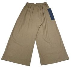 a pair of beige pants with blue patches on the side