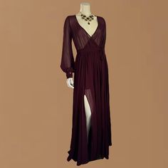 Olivaceous | Women’s Sheer Burgundy Billowing Long Sleeve Maxi Dress Flowy Wrap Dress | Size S New! Never Worn, With No Visible Sign Of Flaws. Video Does No Justice, Prettier In Person Rn# 135773 Gorgeous And Sexy Burgundy Floor Length Maxi Dress. A Sheer See-Through Plunging V-Neck, Wrap Bodice Sits Around A Scrunched Elastic Waist With A Tie Belt And Cascading Full Maxi Skirt With A Sultry Two Side Leg Splits. Beautiful Billowing Long Sleeves With Button Cuffs. Loose And Flowy Skirt Has A Mini Burgundy Goddess Dress, Long Purple Dress Casual, Sheer Wrap Dress, Evening Dress With Sheer Sleeves, Flowy Floor-length Dress For Date Night, Burgundy Long Sleeve Maxi Dress For Date Night, Chic Long Dresses With Sheer Sleeves, Floor-length Dresses With Sheer Sleeves For Fall, Fall Dresses With Sheer Sleeves And Floor-length